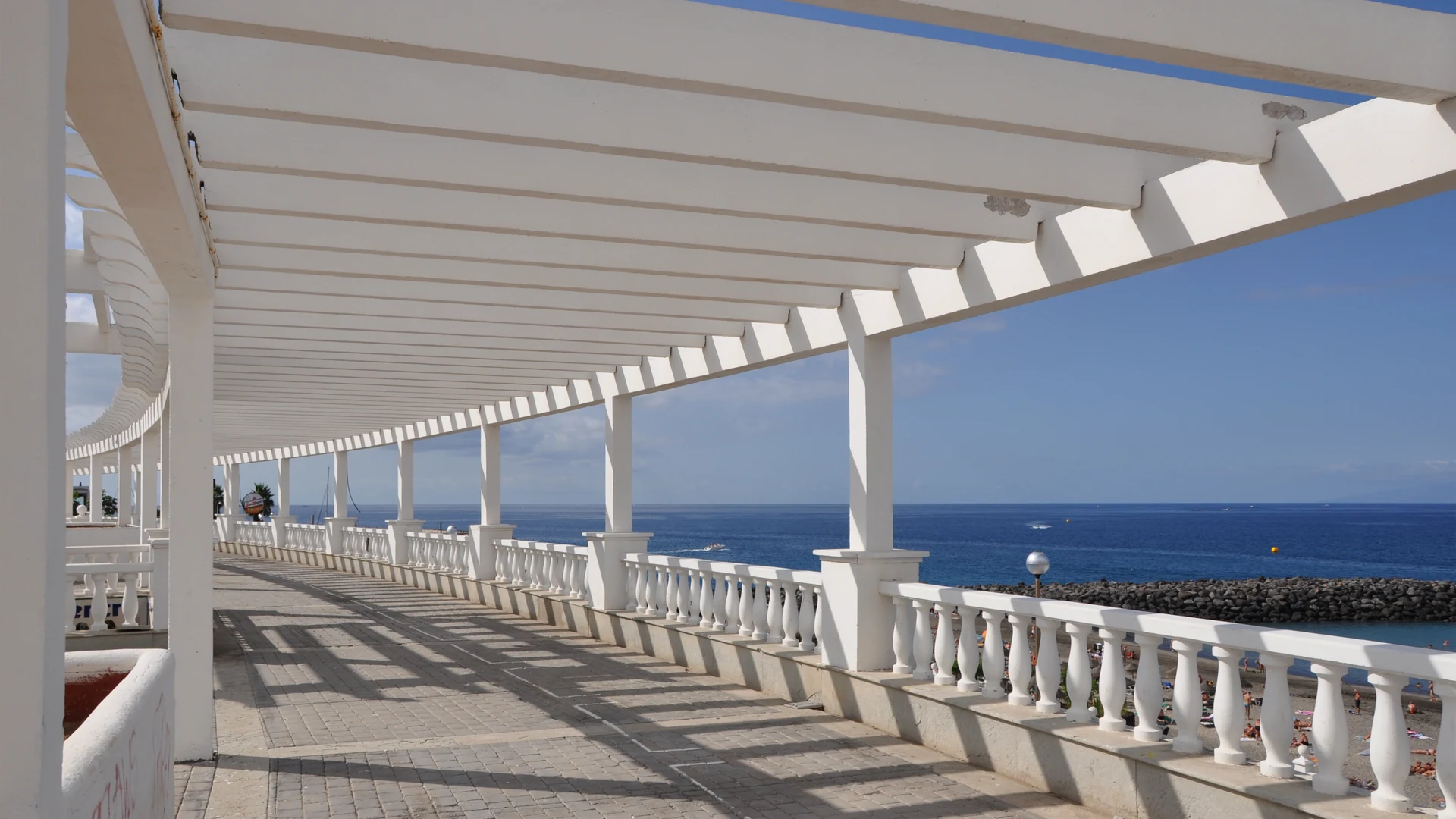 The wide sand and hotel frontage at Playa de Fañabé in Costa Adeje, Tenerife