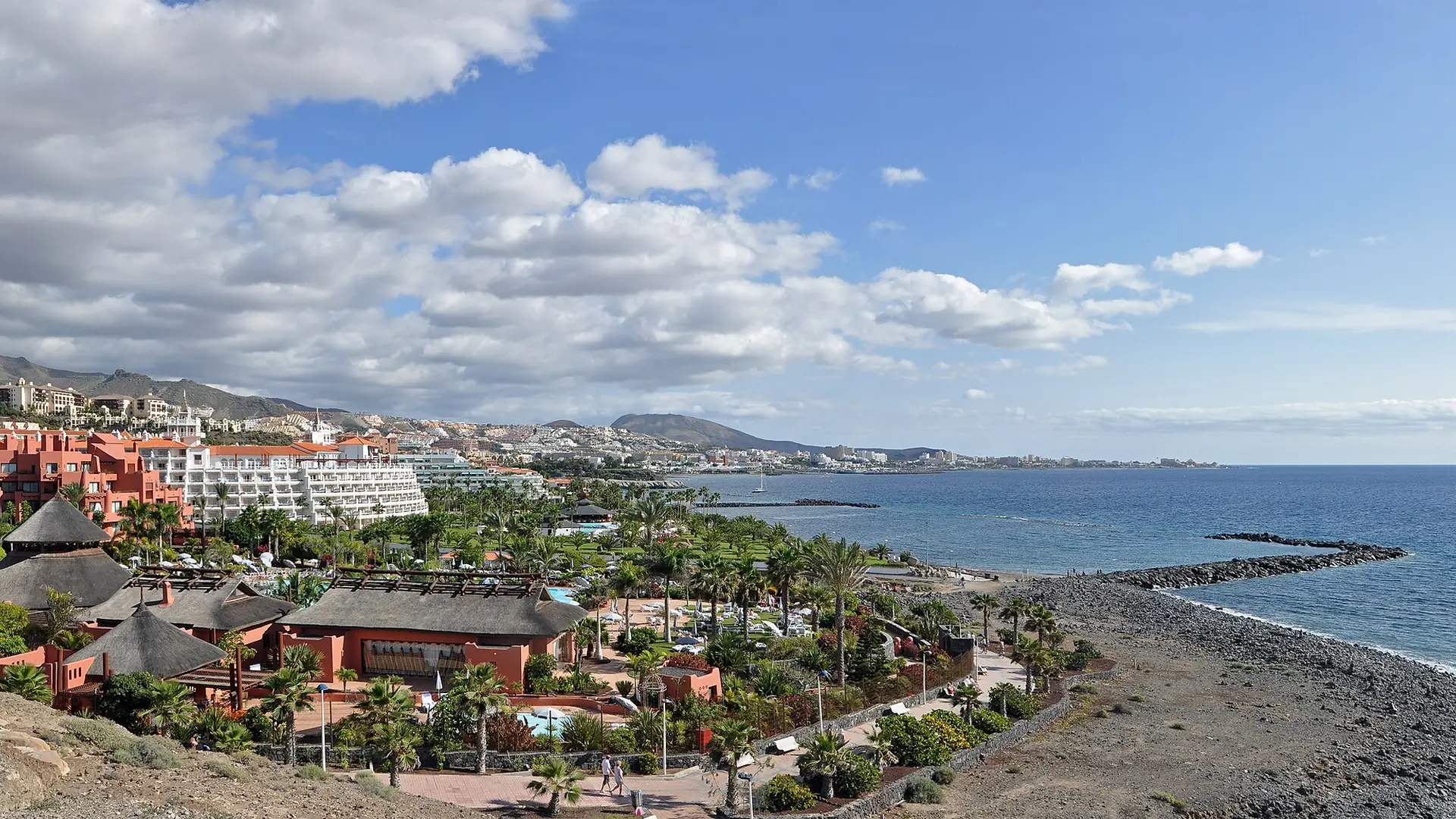 Resort hotels and pools above the seafront at Costa Adeje in southern Tenerife