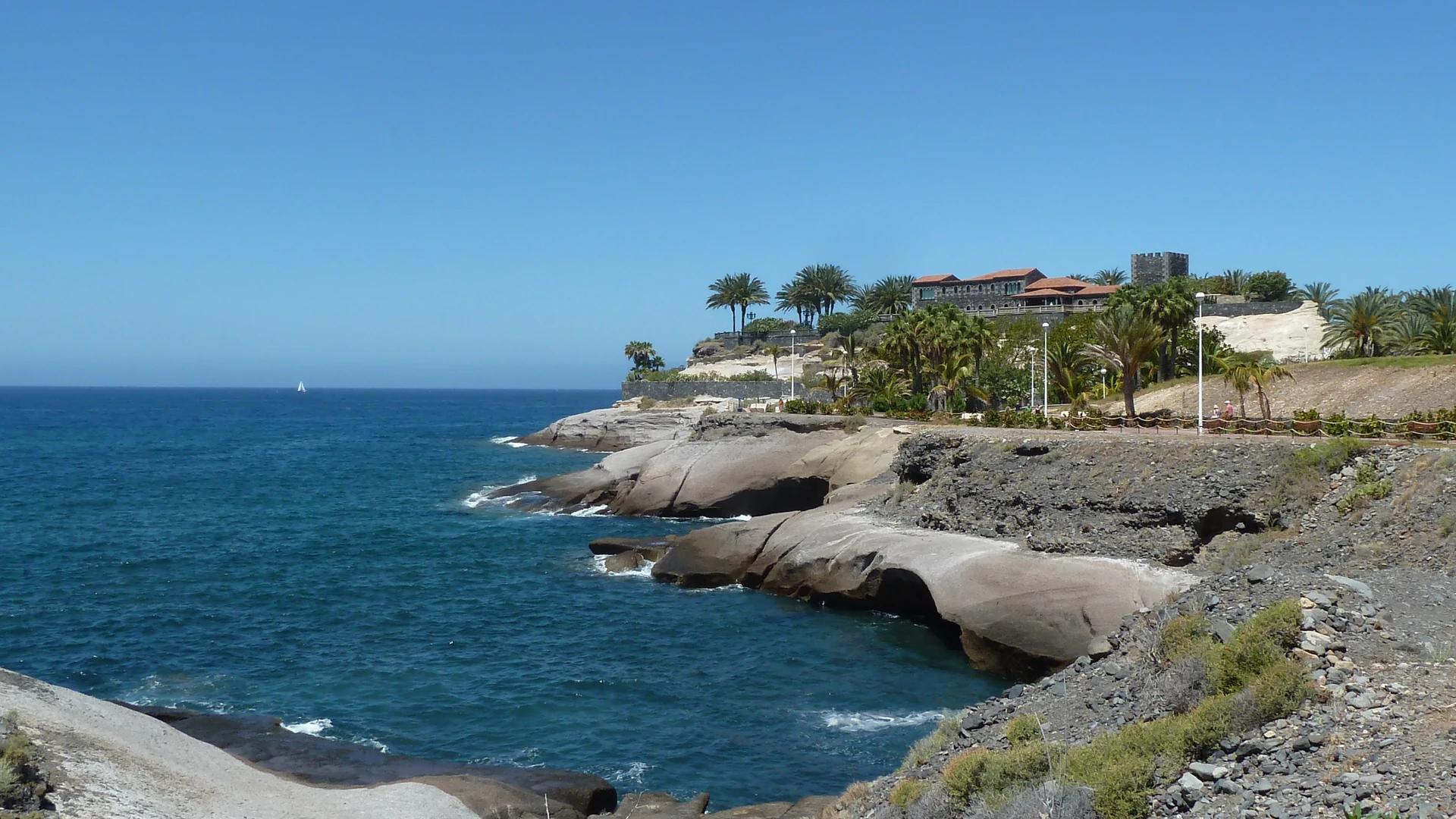 The seafront at Playa de Fañabé in Costa Adeje, Tenerife, lined with restaurants and terraces