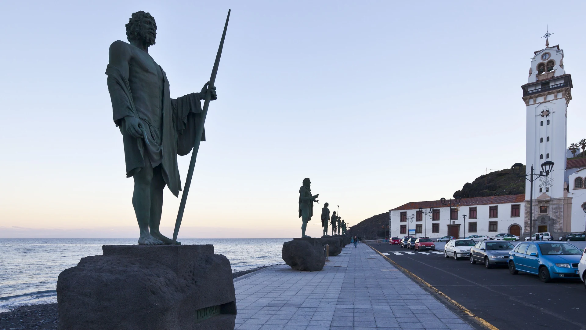 Bronze statues of Guanche chiefs lining the seafront in front of the Basilica of Candelaria, Tenerife