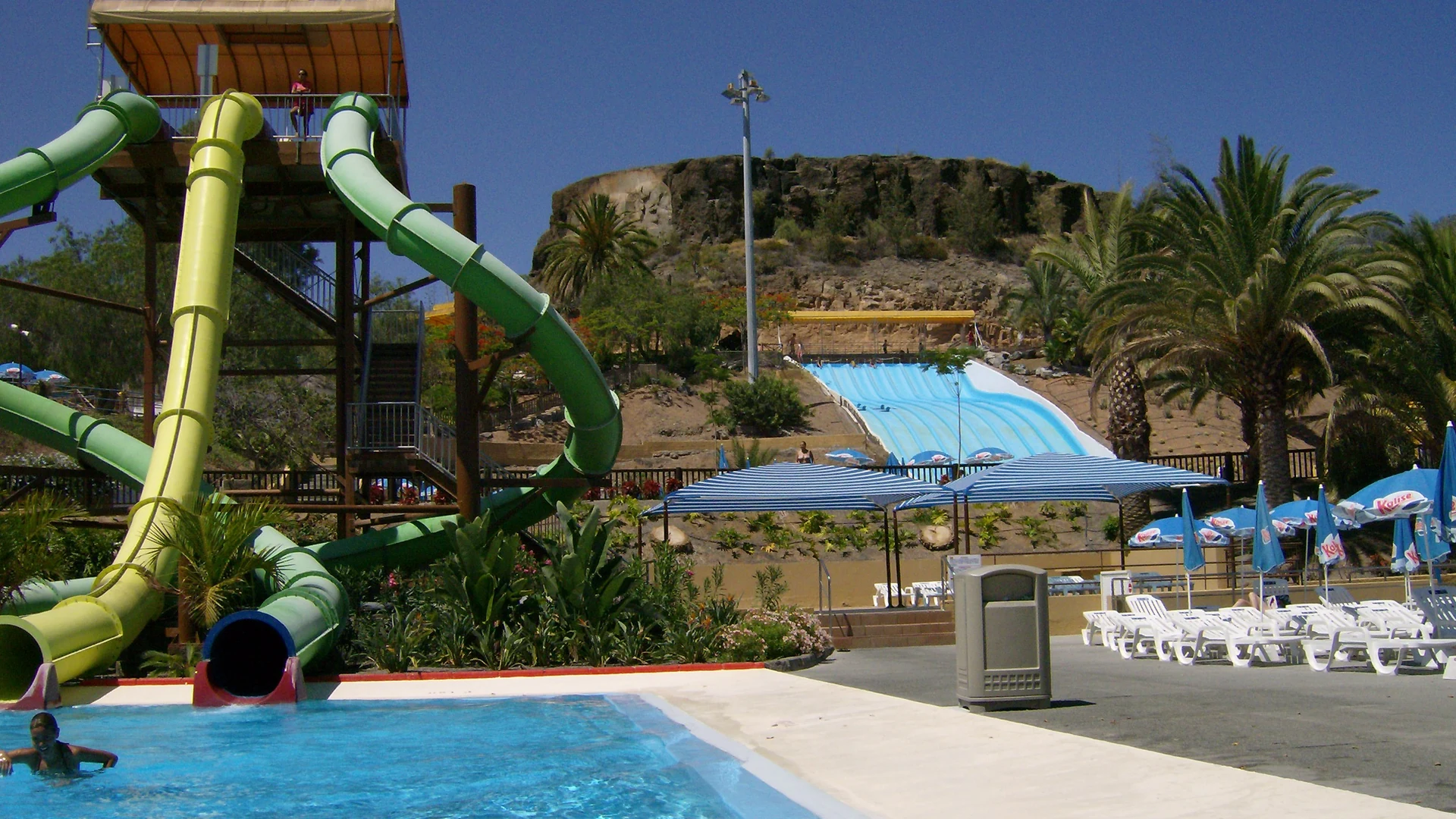 Water slides above a splash pool at Aqualand Maspalomas water park in southern Gran Canaria