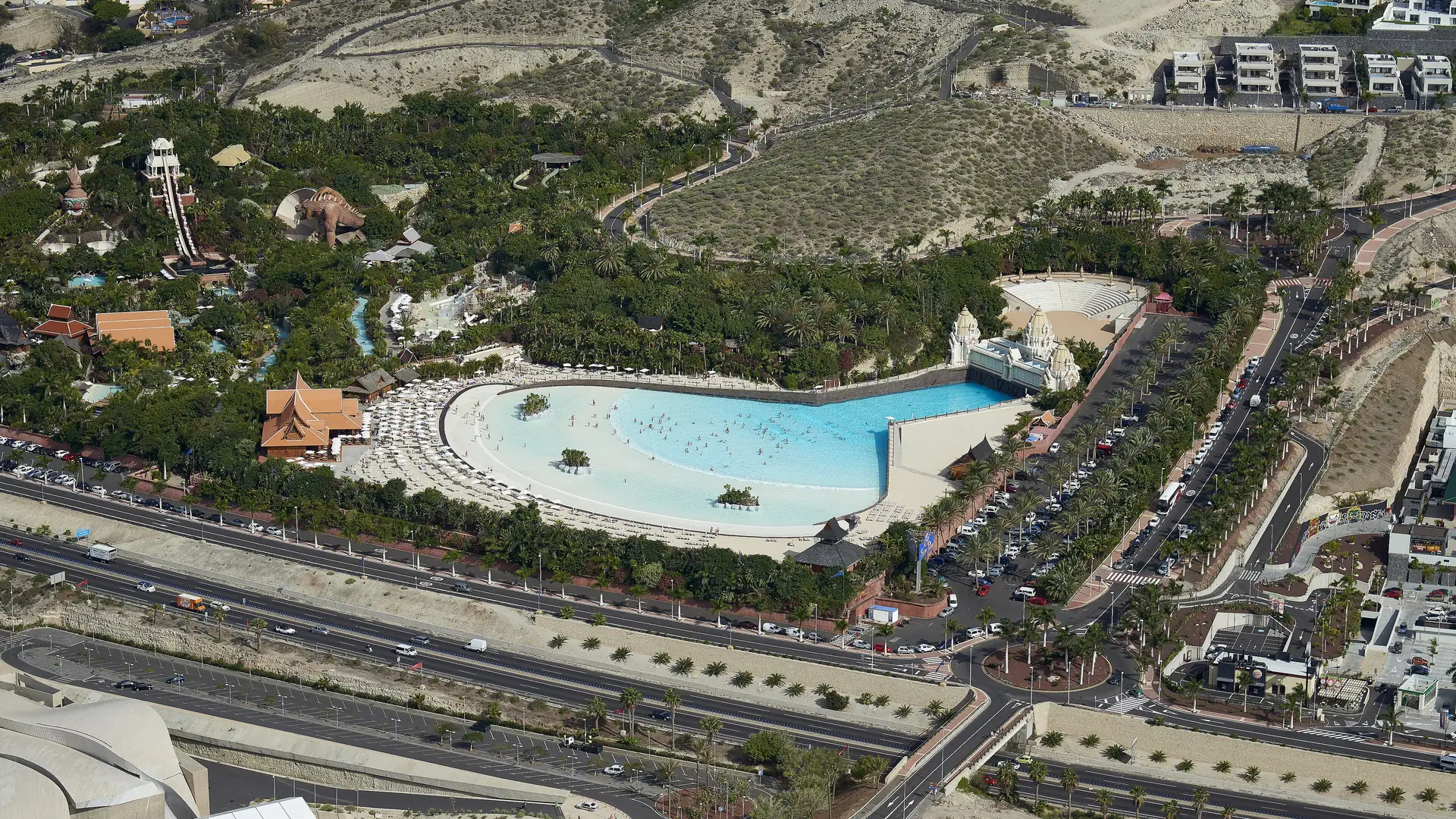 Aerial view of Siam Park in Costa Adeje, Tenerife, with the Wave Palace beach pool and the Thai-styled slide towers