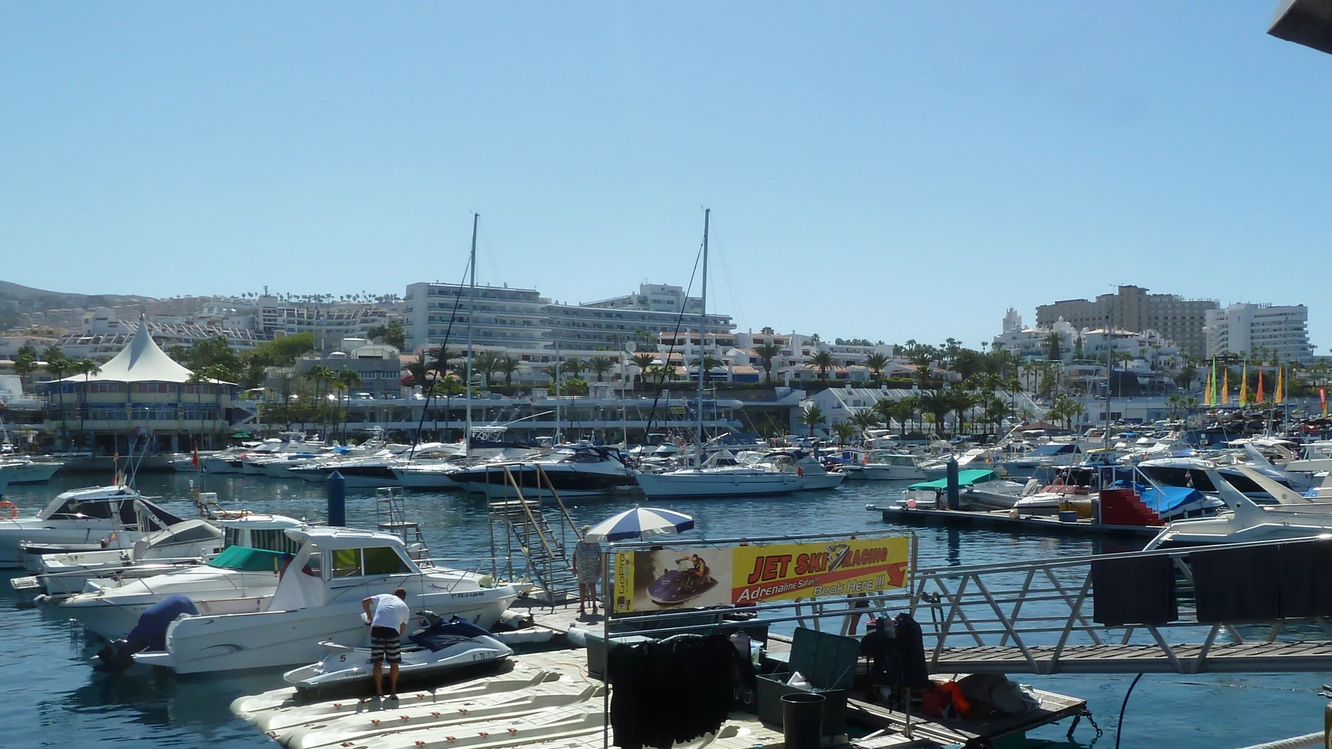 The Puerto Colón marina at Costa Adeje in south-west Tenerife, where parasailing boats depart